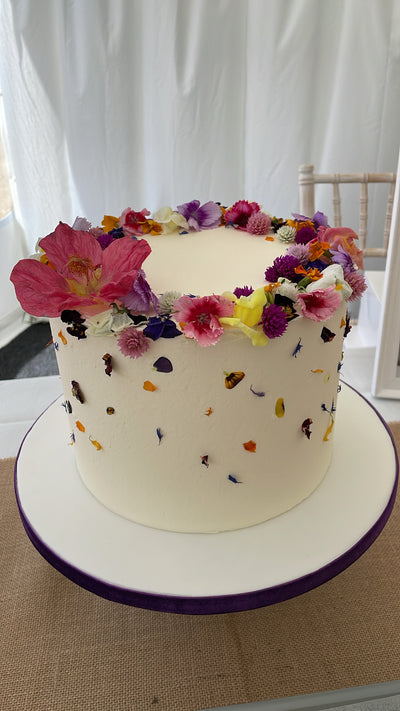 My favourite! Statement single tiered cutting cake adorned with fresh edible and pressed flowers.